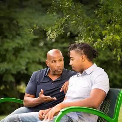 Two men discussing diabetes awareness